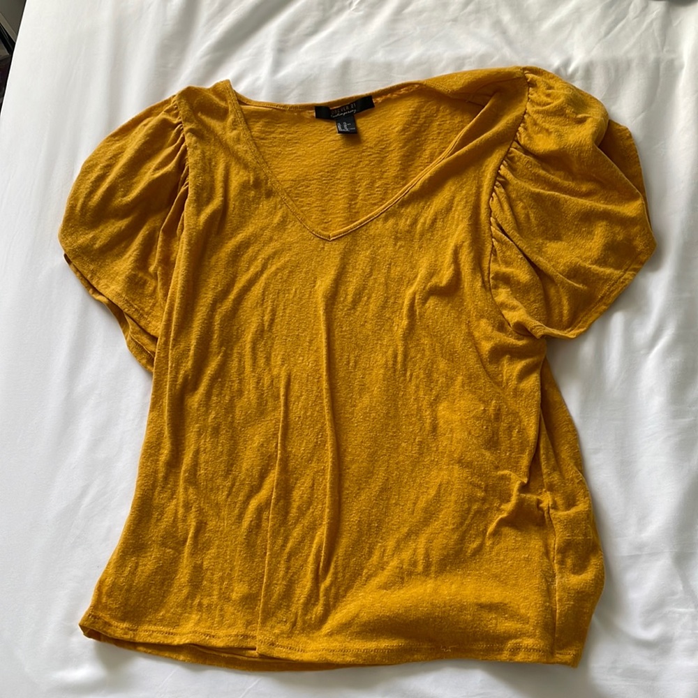 V-neck blouse. Size XL. Runs smaller